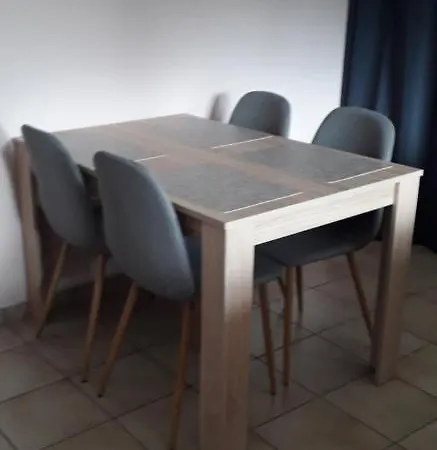 à Au Rez-de-chaussée *