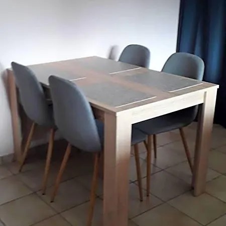 à Au Rez-de-chaussée *